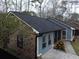 Newly painted house with screened porch and brick accents at 402 Citadel St, Ladson, SC 29456