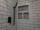 Modern shower with white subway tiles and mosaic accents at 402 Citadel St, Ladson, SC 29456