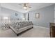 Bright bedroom with a queen-size bed and nightstand at 4041 Oxeye Loop, Johns Island, SC 29455