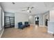 Bright bonus room with ceiling fan and two comfy armchairs at 4041 Oxeye Loop, Johns Island, SC 29455