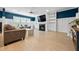 Spacious living room with fireplace, built-in shelving, and hardwood floors at 4041 Oxeye Loop, Johns Island, SC 29455