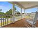 Relaxing front porch with rocking chairs and view at 4041 Oxeye Loop, Johns Island, SC 29455