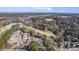 Aerial view of community near golf course and marsh at 4816 8Th Tee Dr, Hollywood, SC 29449