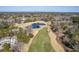 Aerial view of golf course and houses at 4816 8Th Tee Dr, Hollywood, SC 29449