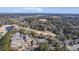 Aerial view of community by golf course and marsh at 4816 8Th Tee Dr, Hollywood, SC 29449