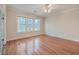 Bright bedroom with hardwood floors and access to balcony at 4816 8Th Tee Dr, Hollywood, SC 29449