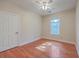 Bedroom with hardwood floors and ceiling fan at 4816 8Th Tee Dr, Hollywood, SC 29449
