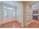 Bright entryway with hardwood floors and built-in shelving at 4816 8Th Tee Dr, Hollywood, SC 29449