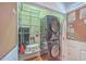 Laundry room with washer, dryer, and built-in shelving at 4816 8Th Tee Dr, Hollywood, SC 29449