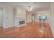 Hardwood floors, fireplace, and open layout living space at 4816 8Th Tee Dr, Hollywood, SC 29449