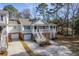 Two-story townhouse with front porch and stairs at 4816 8Th Tee Dr, Hollywood, SC 29449