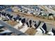 Aerial view of a community with houses and a pond at 482 Hidden Meadow Ln, Summerville, SC 29486