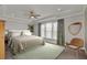 Spacious bedroom with a king-size bed and large windows at 482 Hidden Meadow Ln, Summerville, SC 29486