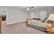 Bright bedroom with a wooden bed frame and access to bonus room at 482 Hidden Meadow Ln, Summerville, SC 29486