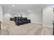 Spacious bonus room with home theater and seating at 482 Hidden Meadow Ln, Summerville, SC 29486
