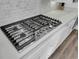 Stainless steel gas cooktop with white cabinets at 482 Hidden Meadow Ln, Summerville, SC 29486