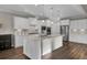 Modern kitchen featuring white cabinets and a large island at 482 Hidden Meadow Ln, Summerville, SC 29486