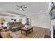 Open concept living room with hardwood floors and fireplace at 482 Hidden Meadow Ln, Summerville, SC 29486