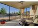 Relaxing screened porch with seating and views of the backyard at 482 Hidden Meadow Ln, Summerville, SC 29486