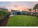 Large backyard with a grassy area and privacy fence at 531 Switchgrass Dr, Summerville, SC 29486