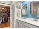 Double vanity bathroom with walk-in shower and large closet at 531 Switchgrass Dr, Summerville, SC 29486
