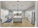 Modern community kitchen with island and stainless steel appliances at 531 Switchgrass Dr, Summerville, SC 29486