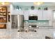 Kitchen sink and granite countertop with stainless steel appliances at 531 Switchgrass Dr, Summerville, SC 29486