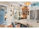 Bright kitchen with granite countertops, built-in shelving, and breakfast nook at 531 Switchgrass Dr, Summerville, SC 29486
