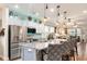 Modern kitchen with stainless steel appliances and large granite island at 531 Switchgrass Dr, Summerville, SC 29486