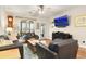 Living room with hardwood floors, fireplace, and comfortable seating at 531 Switchgrass Dr, Summerville, SC 29486