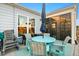 Outdoor patio with a table and chairs, perfect for dining at 531 Switchgrass Dr, Summerville, SC 29486