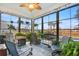 Relaxing sunroom with ample seating and many plants at 531 Switchgrass Dr, Summerville, SC 29486