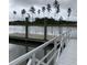 Private wooden dock with aluminum railing, offering serene waterfront access at 569 Richfield Way, Summerville, SC 29486