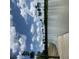 Serene lake view under a partly cloudy sky at 569 Richfield Way, Summerville, SC 29486