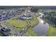Aerial view of a beautiful community with a lake and clubhouse at 711 Blueway Ave, Summerville, SC 29486
