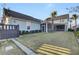 Private backyard with grassy lawn and screened porch at 711 Blueway Ave, Summerville, SC 29486