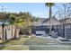 Private backyard oasis with fire pit and seating area at 711 Blueway Ave, Summerville, SC 29486