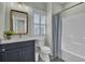 Modern bathroom with updated vanity, toilet and shower/tub combo at 711 Blueway Ave, Summerville, SC 29486