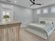 Spacious bedroom with a ceiling fan and neutral decor at 711 Blueway Ave, Summerville, SC 29486