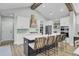 Modern kitchen with white cabinets, quartz countertops, and a large island at 711 Blueway Ave, Summerville, SC 29486