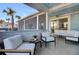 Spacious screened porch with outdoor furniture at 711 Blueway Ave, Summerville, SC 29486