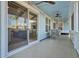 Relaxing screened porch with swing and comfy seating at 711 Blueway Ave, Summerville, SC 29486