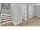 Staircase leading to upper level with light wood flooring at 711 Blueway Ave, Summerville, SC 29486