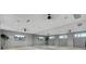 Bright yoga studio with mirrored walls and TVs at 711 Blueway Ave, Summerville, SC 29486