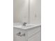 White bathroom vanity with a single sink at 7936 Vermont Rd, North Charleston, SC 29418