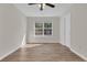 Spacious bedroom with wood-look floors and window at 7936 Vermont Rd, North Charleston, SC 29418