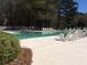 Community swimming pool with lounge chairs at 7936 Vermont Rd, North Charleston, SC 29418