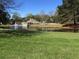 Community pool and pond with clubhouse at 7936 Vermont Rd, North Charleston, SC 29418