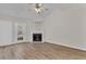 Living room with fireplace and wood-look floors at 7936 Vermont Rd, North Charleston, SC 29418