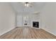 Living room with fireplace and access to backyard at 7936 Vermont Rd, North Charleston, SC 29418